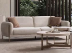 Elora Sofa functional modern living room couch featuring soft rounded armrests and integrated reclining mechanism.