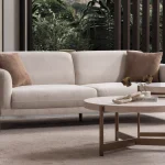Elora Sofa functional modern living room couch featuring soft rounded armrests and integrated reclining mechanism.