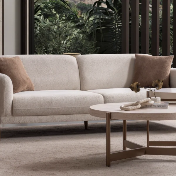 Elora Sofa functional modern living room couch featuring soft rounded armrests and integrated reclining mechanism.