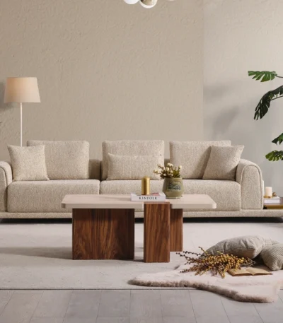 De Elysian modulaire hoekbank herdefinieert de zitervaring met zijn wolkachtige comfort en stijlvolle stoffen bekleding. Een veelzijdig meesterwerk, ontworpen voor moderne Europese woonruimtes.