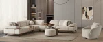 A modern living room featuring the Grace Sofa. The arrangement displays a plush taupe sofa and a matching cream sofa, both designed with distinctive integrated wooden side tables on the armrests and angled wooden legs. A white swivel armchair and a round wooden coffee table complete the cozy, contemporary look of this furniture from Turkey.