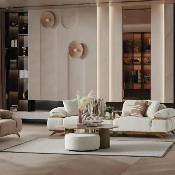 A modern living room featuring the Grace Sofa. The arrangement displays a plush taupe sofa and a matching cream sofa, both designed with distinctive integrated wooden side tables on the armrests and angled wooden legs. A white swivel armchair and a round wooden coffee table complete the cozy, contemporary look of this furniture from Turkey.