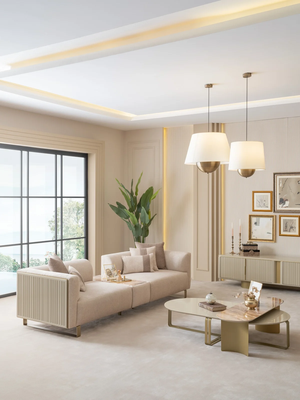 A luxurious modular Grandeur sofa set in a bright, modern living room. The set features cream-colored fabric upholstery with rectangular cushions and sleek gold metallic legs. Beside the modular sections sits a matching rounded armchair with gold accents. The scene includes minimalist decor, a marble coffee table, and large windows, highlighting the elegant design of the Grandeur furniture from Turkey.