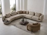 Harmoni Corner Sofa Prime Lounge Soft Trio Set featuring a large curved modular sofa in cream, paired with a matching accent chair, modern interior.
