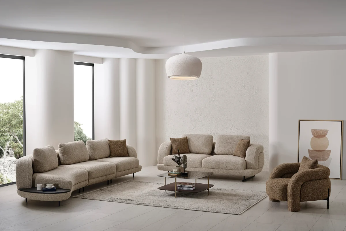 Close-up of the Harmoni Prime Lounge Soft Set featuring its sculptural curved silhouette, premium off-white bouclé upholstery, and seamless modular segments designed for ergonomic luxury.