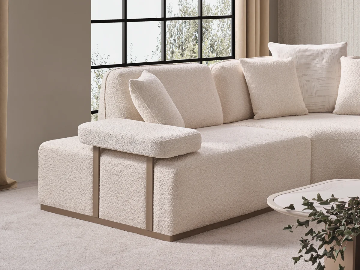 The Inara Corner Sofa adds a sophisticated touch to your living space with its timeless fabric and minimalist design. Its modular structure allows it to perfectly fit into any room.