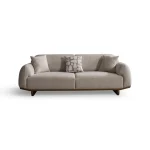 Modern rounded sofa with white boucle fabric and wooden base, luxury turkish furniture.