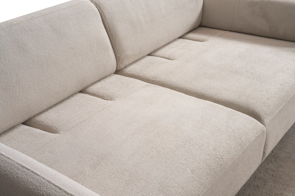 Modern rounded sofa with white boucle fabric and wooden base, luxury turkish furniture.