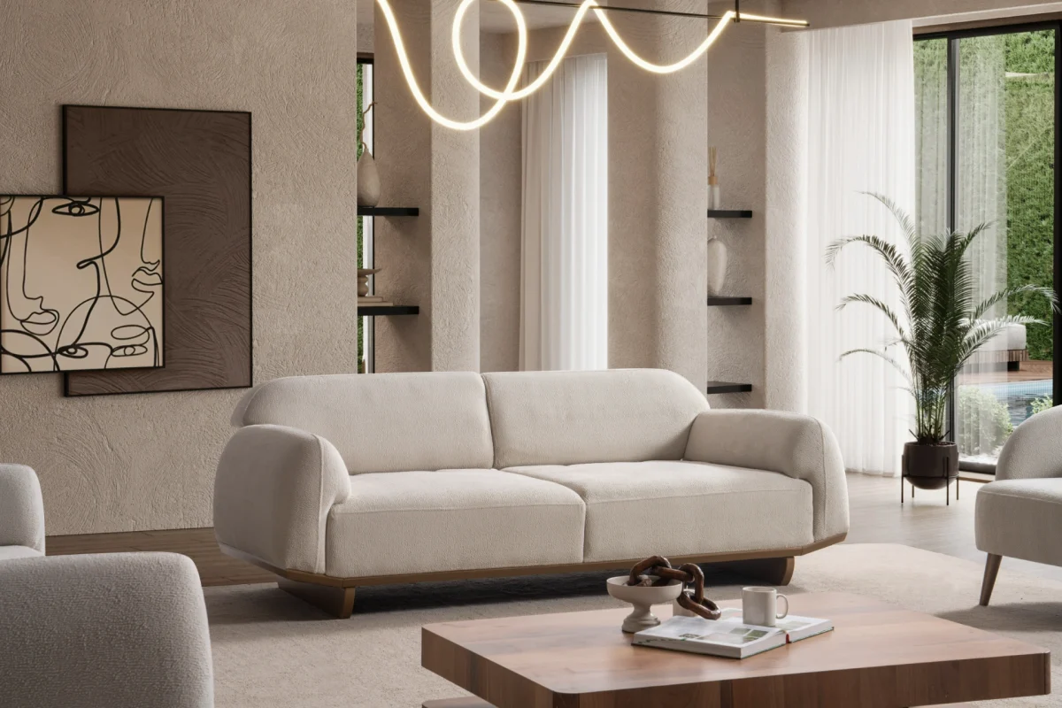 Laos Sofa Set by SofaTurkey featuring a modern rounded design in premium white boucle fabric, including two sofas and an armchair in a minimalist living room setting.