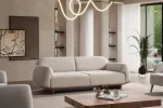 Laos Sofa Set by SofaTurkey featuring a modern rounded design in premium white boucle fabric, including two sofas and an armchair in a minimalist living room setting.