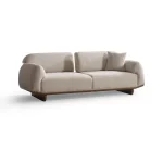 Modern rounded sofa with white boucle fabric and wooden base, luxury turkish furniture.