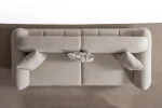 Modern rounded sofa with white boucle fabric and wooden base, luxury turkish furniture.
