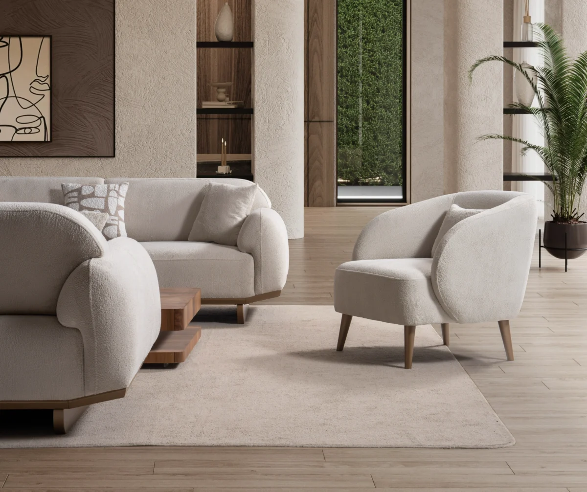 Laos Sofa Set by SofaTurkey featuring a modern rounded design in premium white boucle fabric, including two sofas and an armchair in a minimalist living room setting.