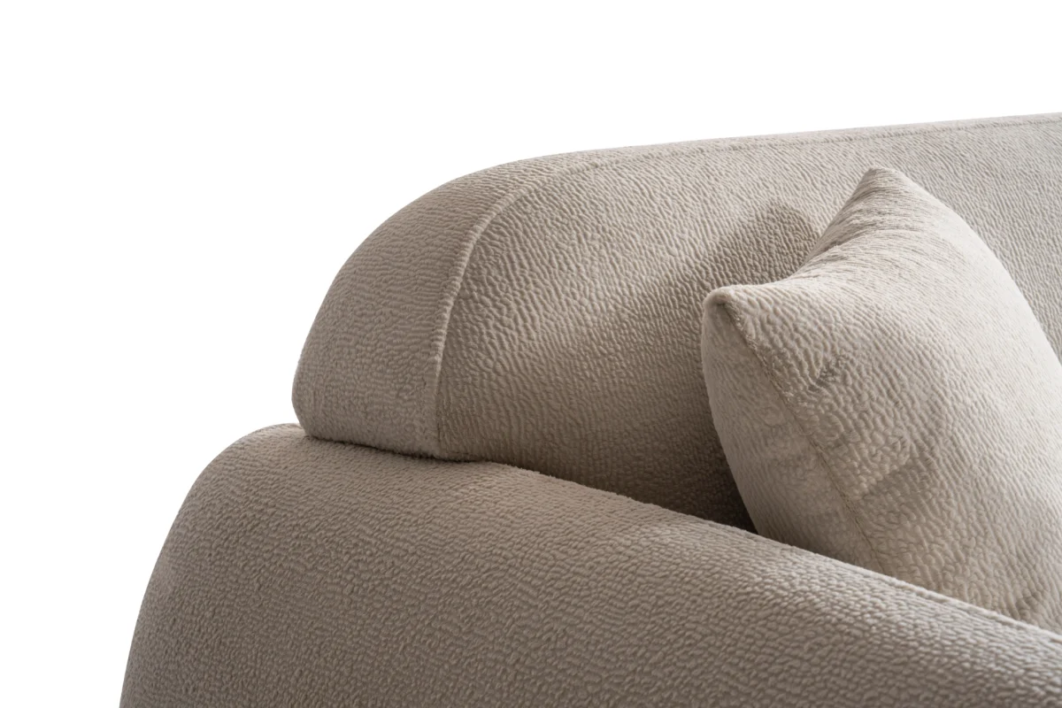 Modern rounded sofa with white boucle fabric and wooden base, luxury turkish furniture.