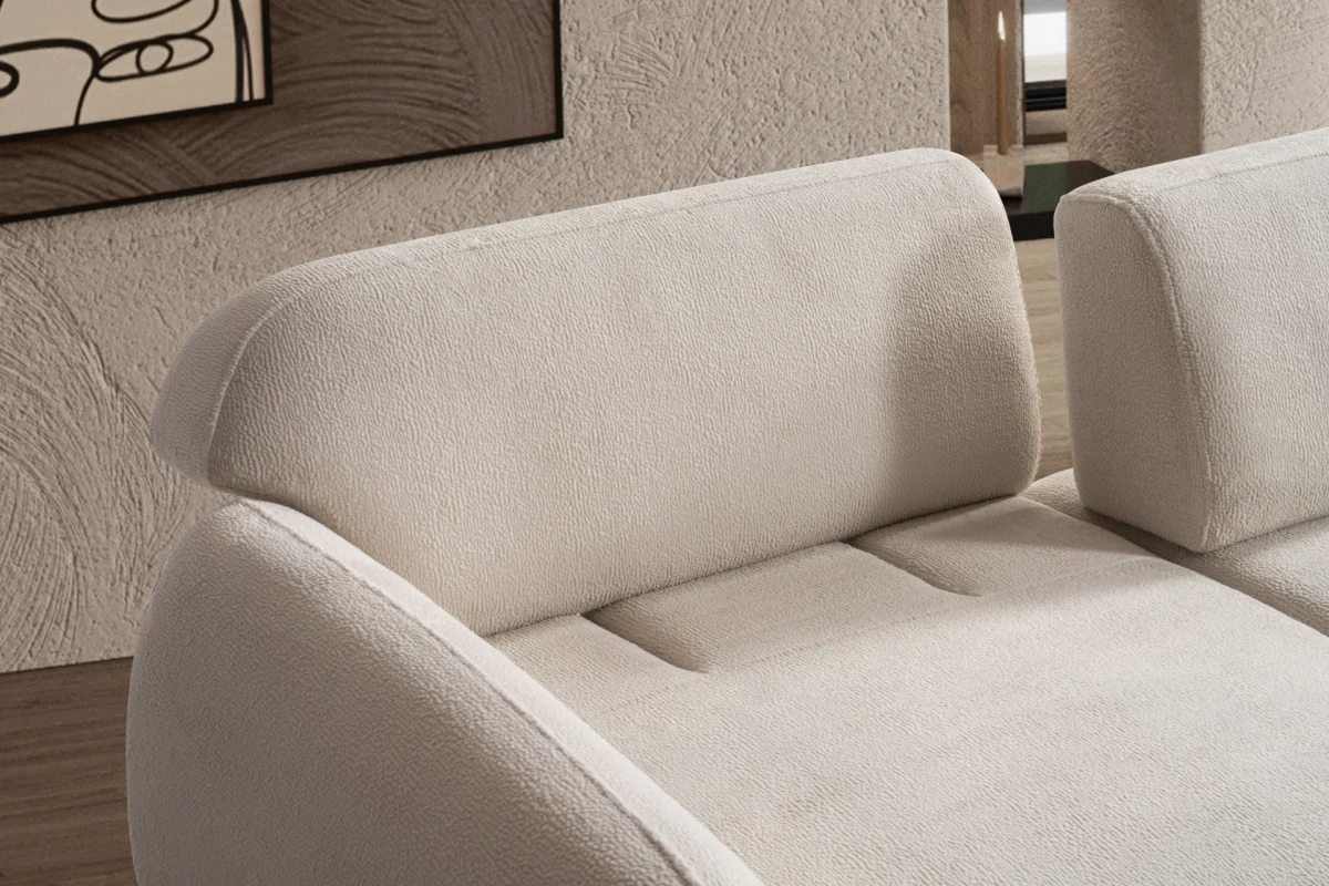 Modern rounded sofa with white boucle fabric and wooden base, luxury turkish furniture.