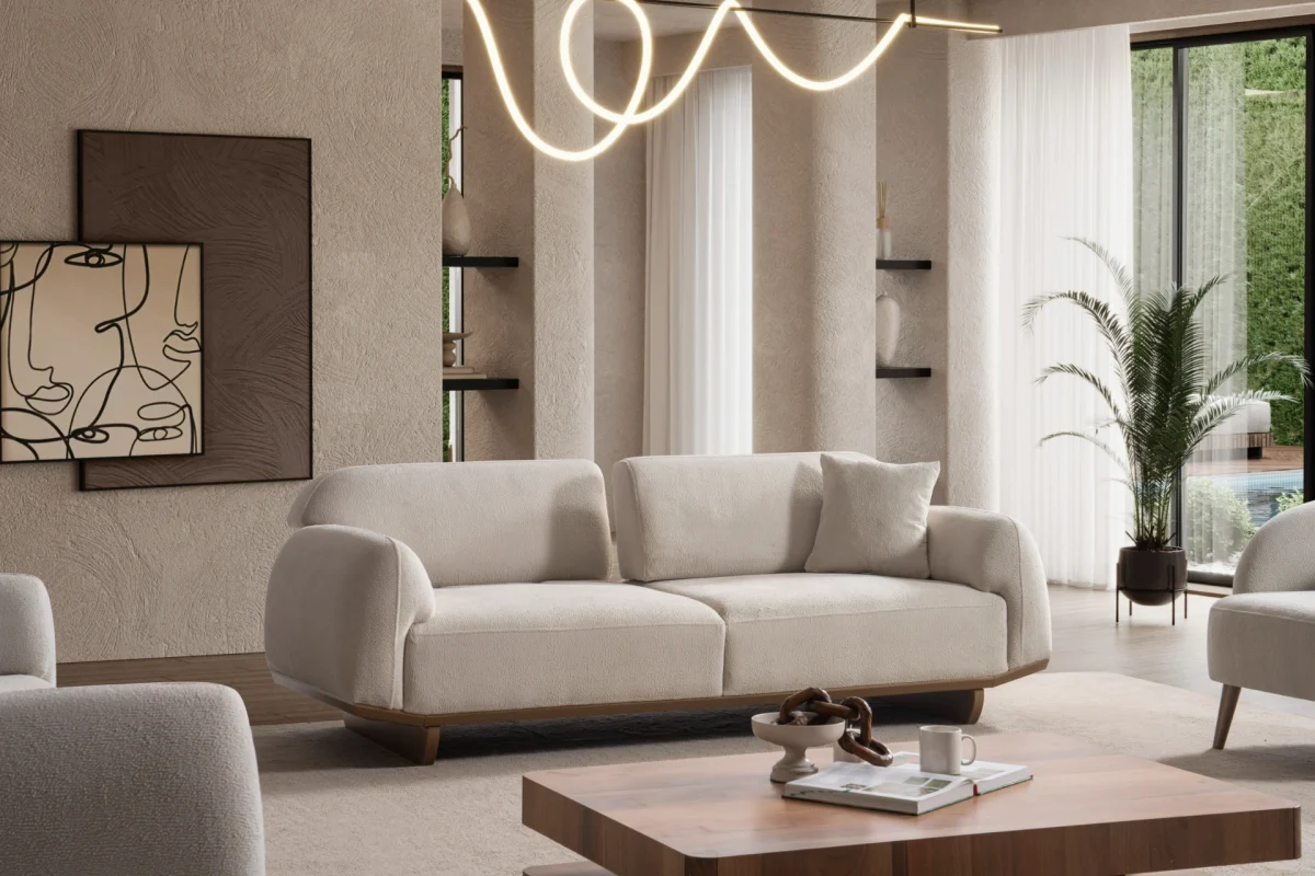 Laos Sofa Set by SofaTurkey featuring a modern rounded design in premium white boucle fabric, including two sofas and an armchair in a minimalist living room setting.