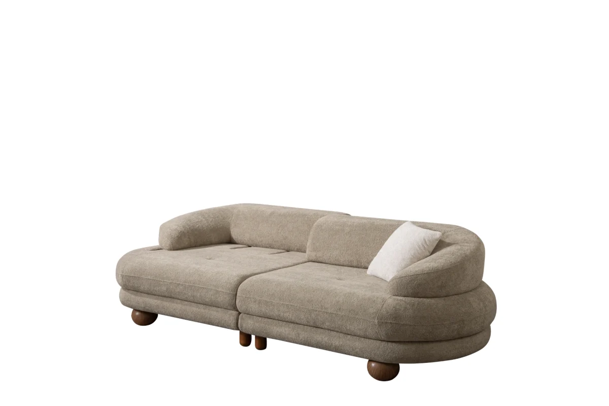 Premium sand grey curved sofa with sculptural round wooden legs and decorative cushions