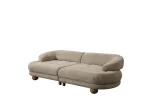 Premium sand grey curved sofa with sculptural round wooden legs and decorative cushions