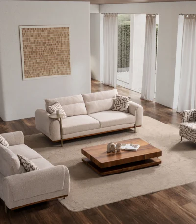 A complete modern living room sofa set composed of two spacious multi-seater sofas with integrated metal side trays and a matching accent armchair with geometric pattern upholstery, centered around a warm wooden coffee table.