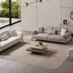 Lina Set Sofa featuring two modern sofas and a rounded accent armchair arranged in a living room.