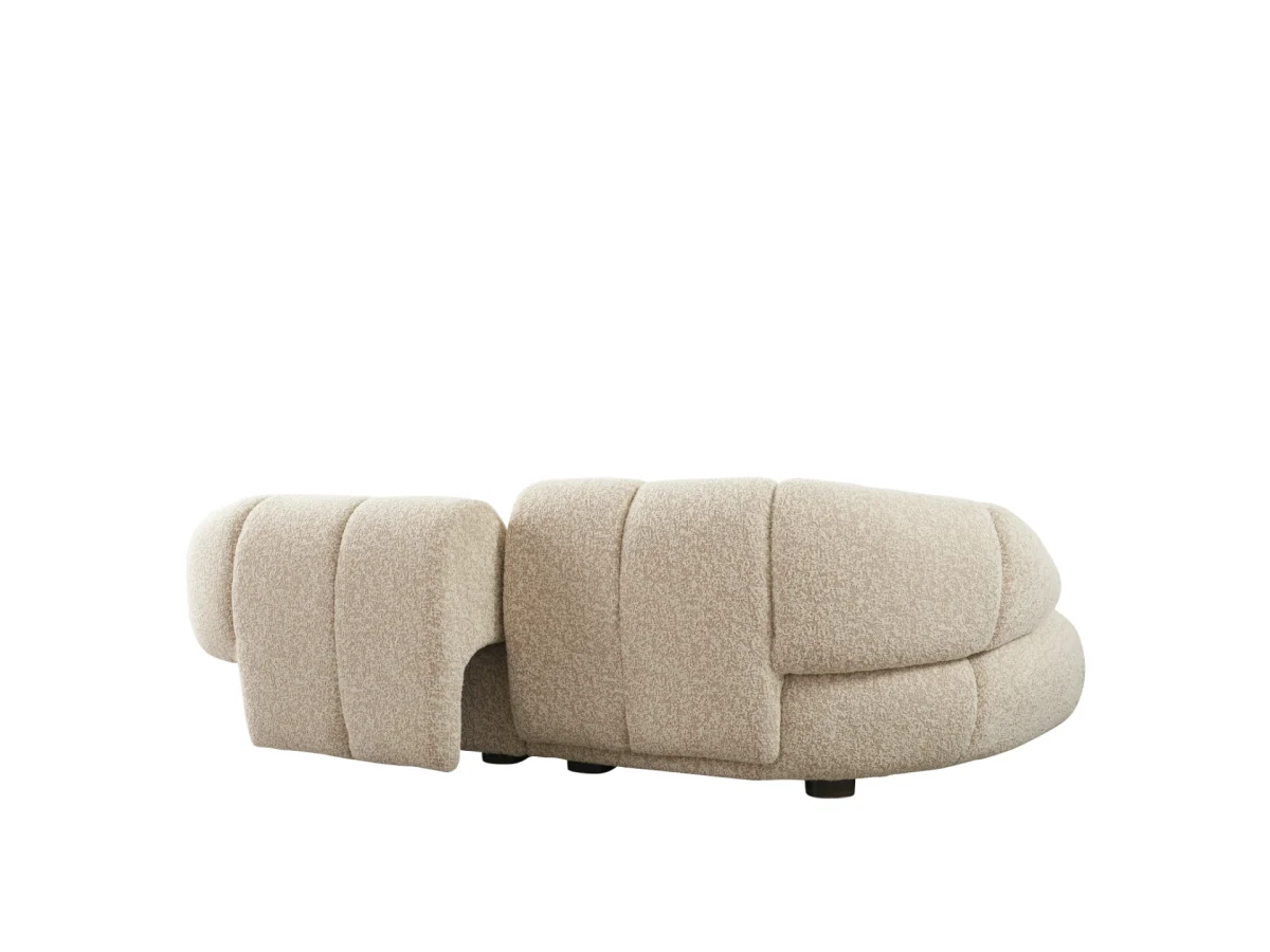 The Loris Sofa brings sculptural elegance to your home. With its signature texture and soft fabric, it offers a sophisticated relaxation experience for contemporary living.