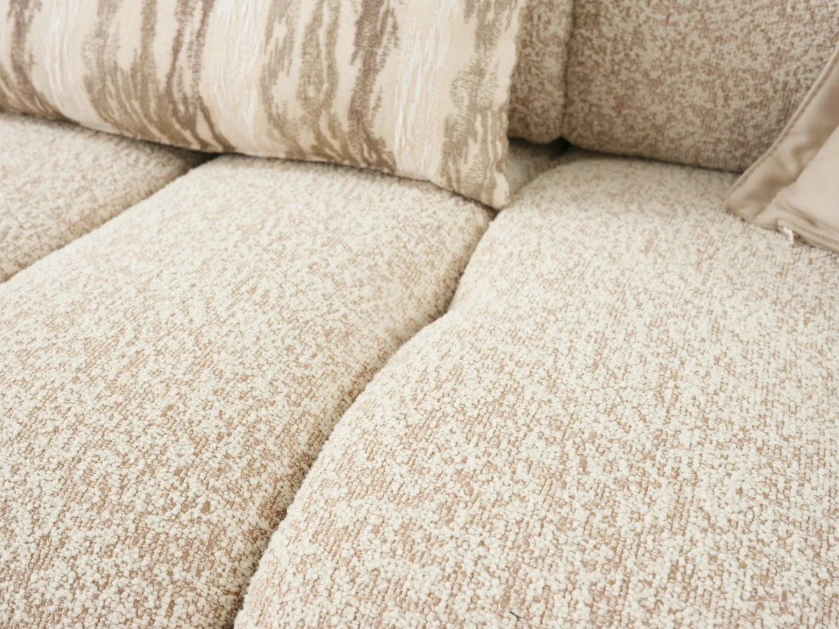 The Loris Sofa brings sculptural elegance to your home. With its signature texture and soft fabric, it offers a sophisticated relaxation experience for contemporary living.