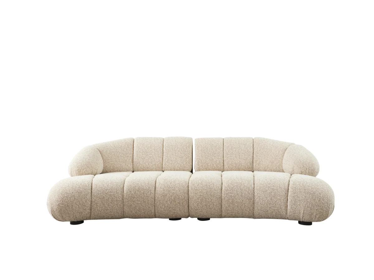 The Loris Sofa brings sculptural elegance to your home. With its signature texture and soft fabric, it offers a sophisticated relaxation experience for contemporary living.