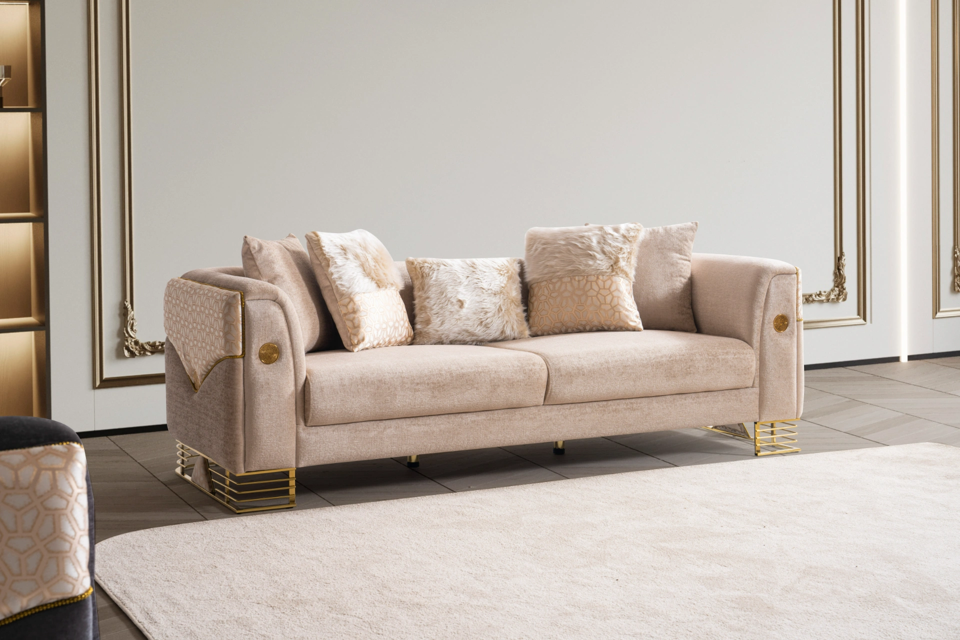 Luxia Sofa Premium Sofa from SofaTurkey Turkish Furniture Elegance Turkish Living Room Sofas 9 Luxia Sofa Set featuring a charcoal velvet three-seater, a blush pink loveseat with geometric patterns, and matching armchairs. The set is detailed with gold-toned metal bases and frames, set in a neoclassical room with arched windows and ornate wall moldings.