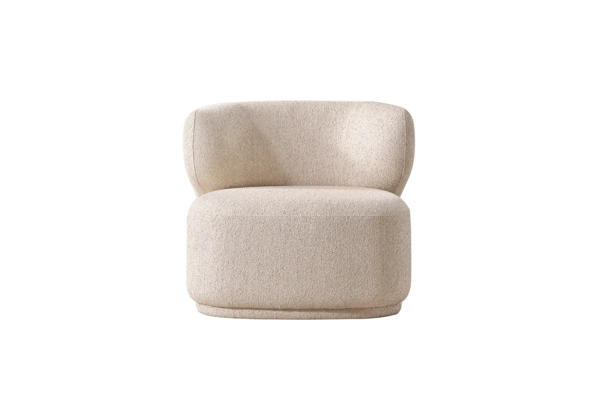 The Lyra Armchair combines high-fashion aesthetics with cocoon-like comfort. Its curved silhouette and soft texture make it the perfect focal point for any modern interior.
