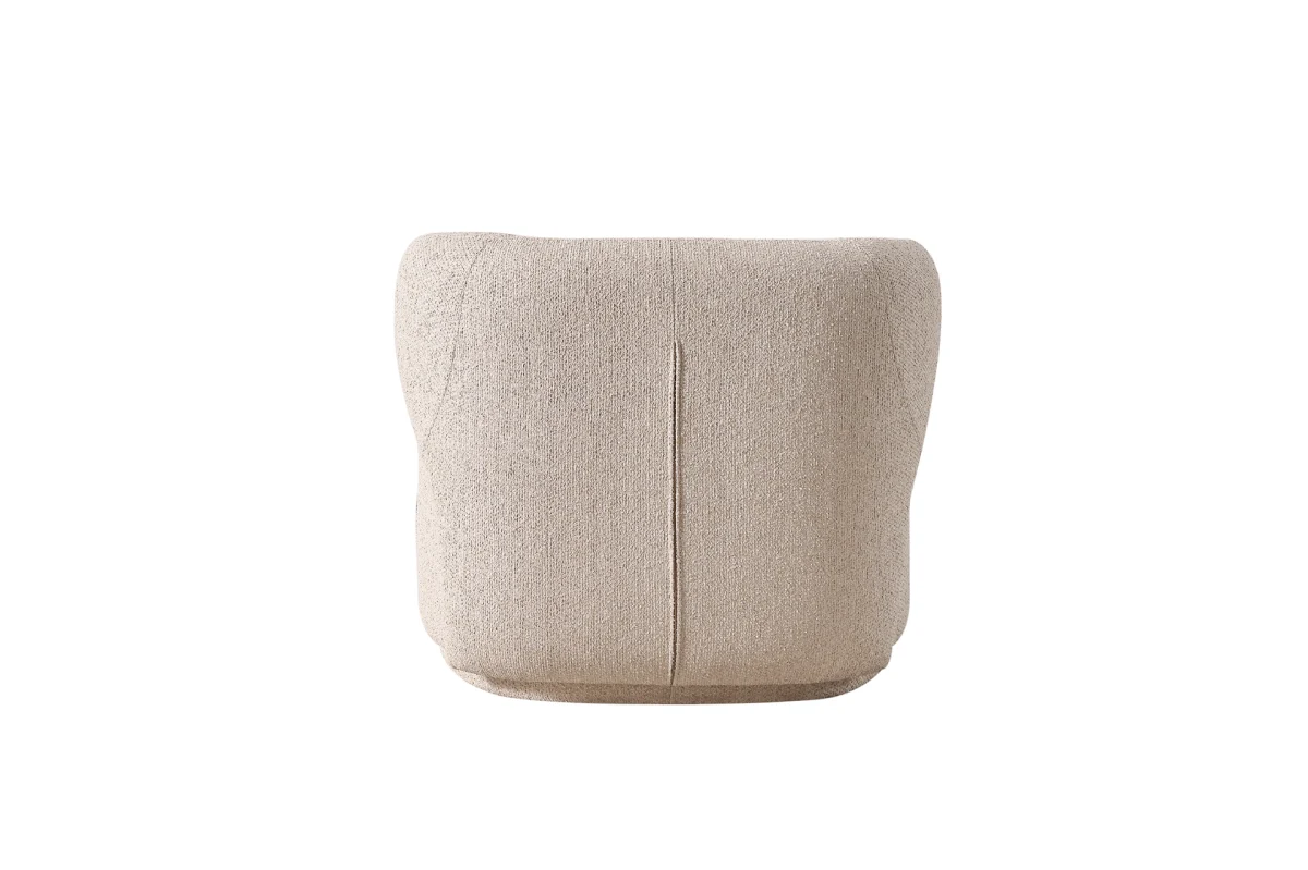 The Lyra Armchair combines high-fashion aesthetics with cocoon-like comfort. Its curved silhouette and soft texture make it the perfect focal point for any modern interior.