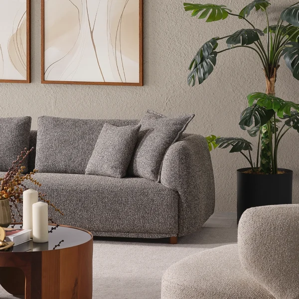 Experience the pinnacle of modern comfort with the Lyra Sofa Set. With its organic curves and highly durable fabric, it's designed for stylish European homes.
