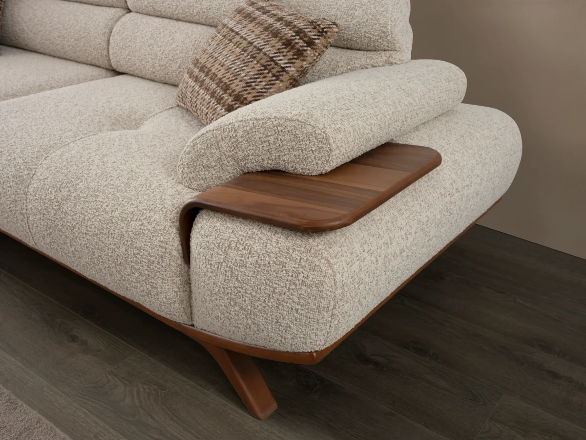 The Maya Sofa combines organic curves with functional luxury. With its fashionable texture and integrated side trays, it's the ultimate statement piece for modern European homes.