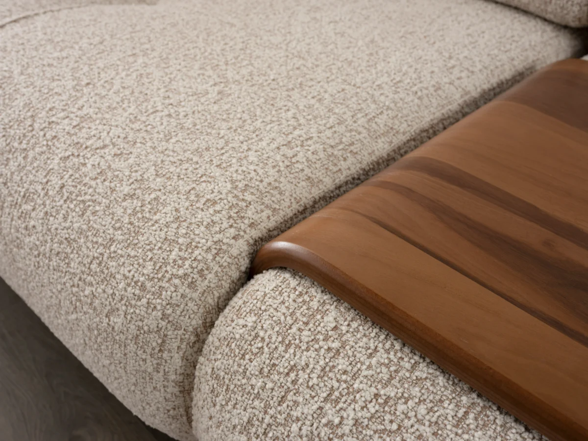 The Maya Sofa combines organic curves with functional luxury. With its fashionable texture and integrated side trays, it's the ultimate statement piece for modern European homes.