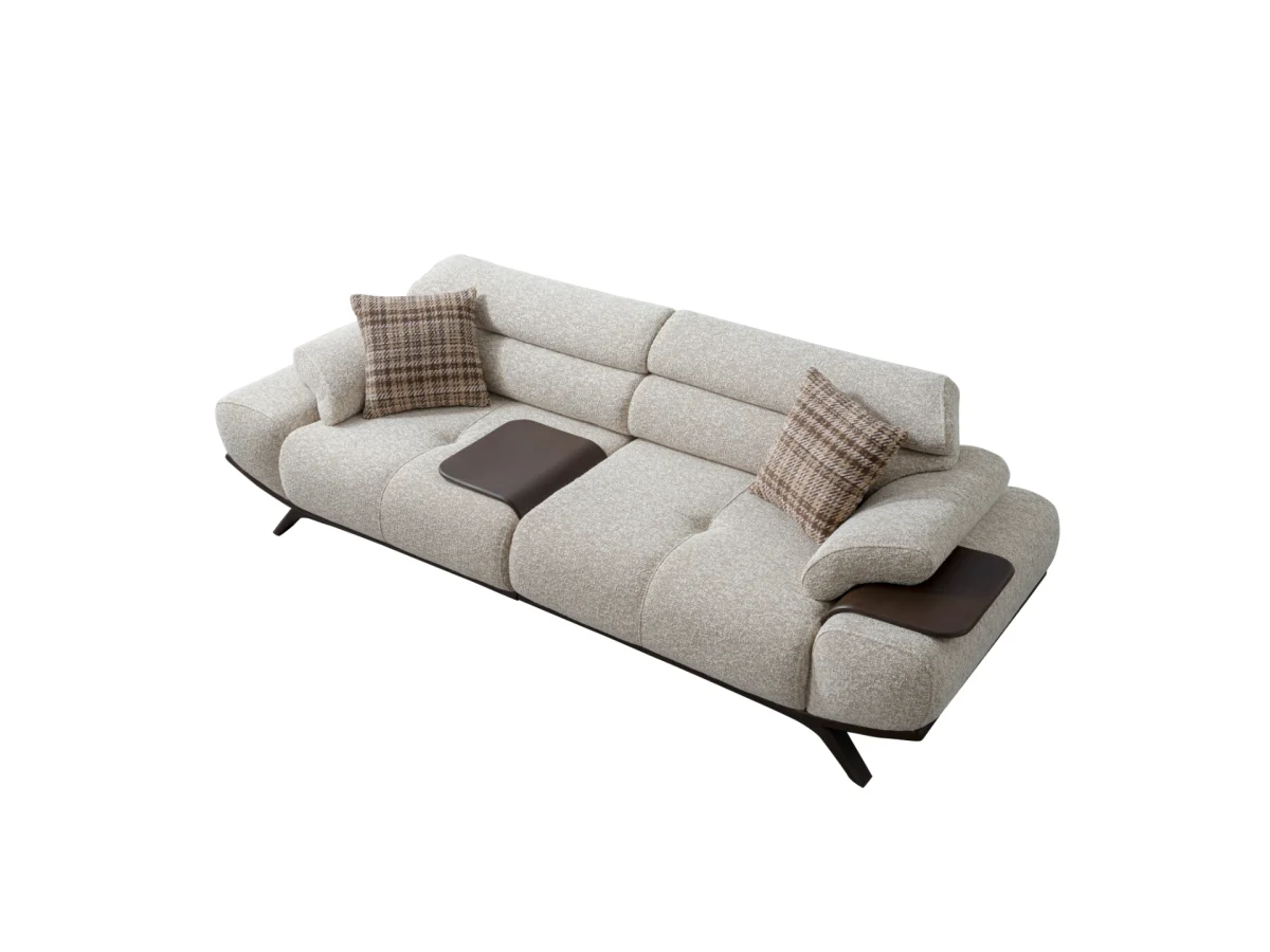 The Maya Sofa combines organic curves with functional luxury. With its fashionable texture and integrated side trays, it's the ultimate statement piece for modern European homes.