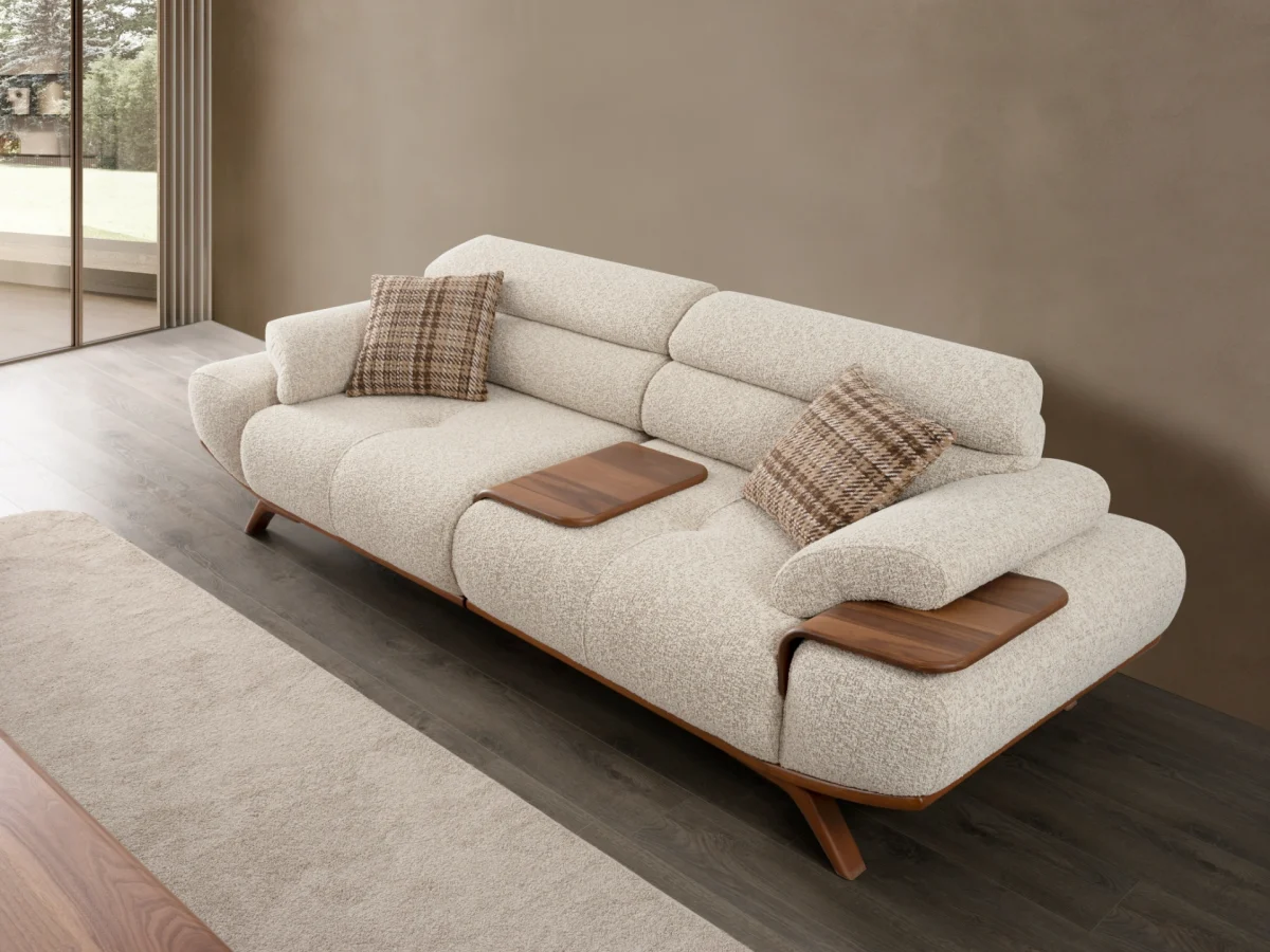 The Maya Sofa combines organic curves with functional luxury. With its fashionable texture and integrated side trays, it's the ultimate statement piece for modern European homes.