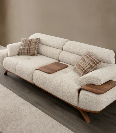 The Maya Sofa combines organic curves with functional luxury. With its fashionable texture and integrated side trays, it's the ultimate statement piece for modern European homes.