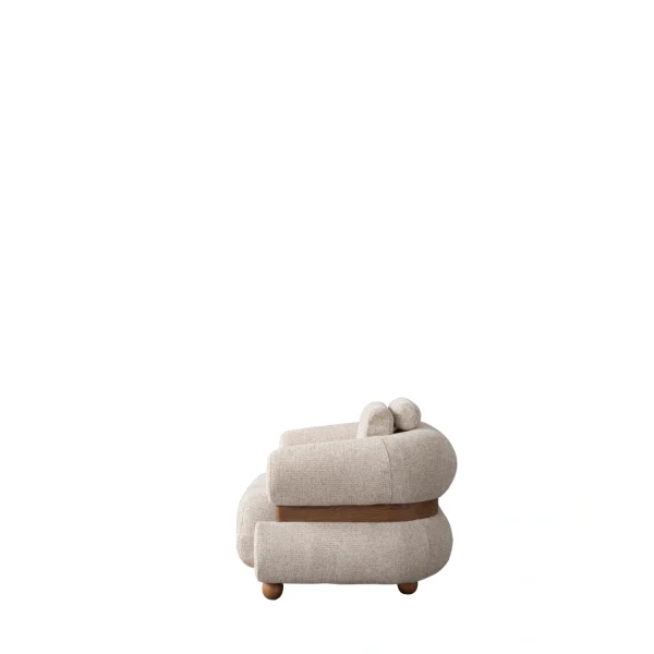 The Milan Armchair is a masterpiece of organic design with its soft upholstery and unique details. It offers a perfect blend of modern sculpture and comfort for any room.