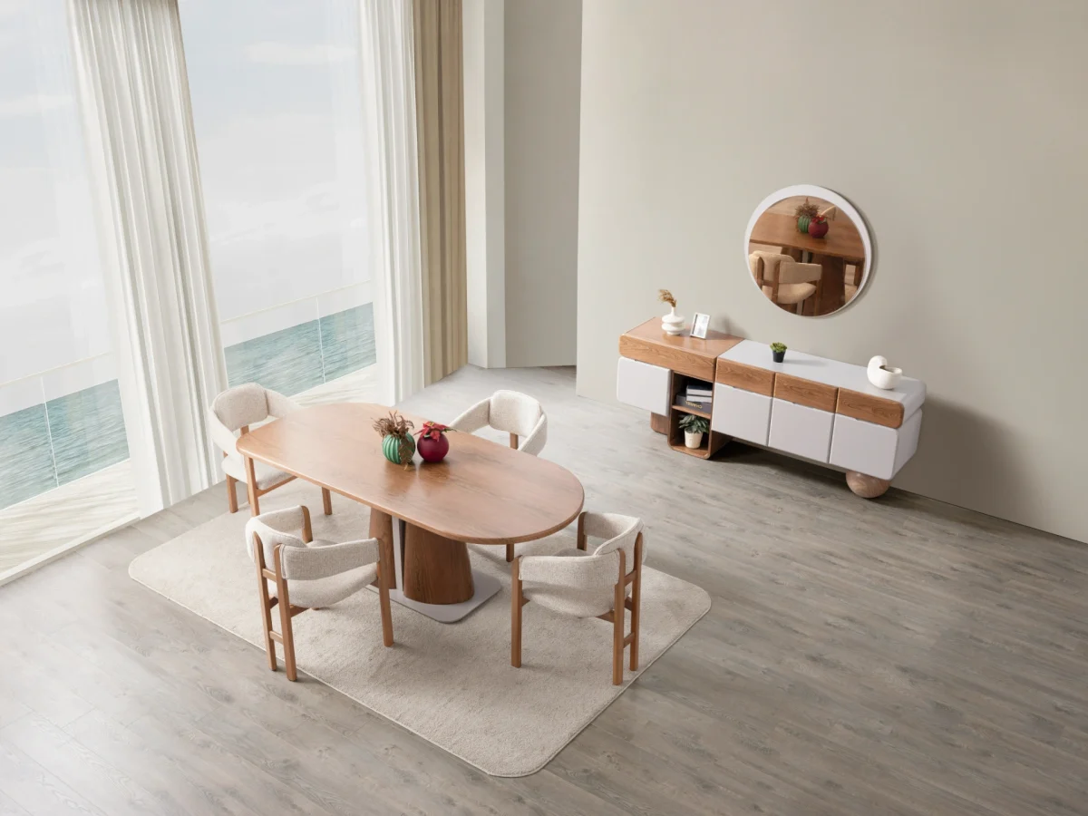 The Milan Dining Table Set is a masterpiece of contemporary craftsmanship. Designed to be the heart of your home, this set includes a stunning dining table with a bold, sculptural pedestal. Its rounded edges create an atmosphere perfect for long meals and meaningful conversations.