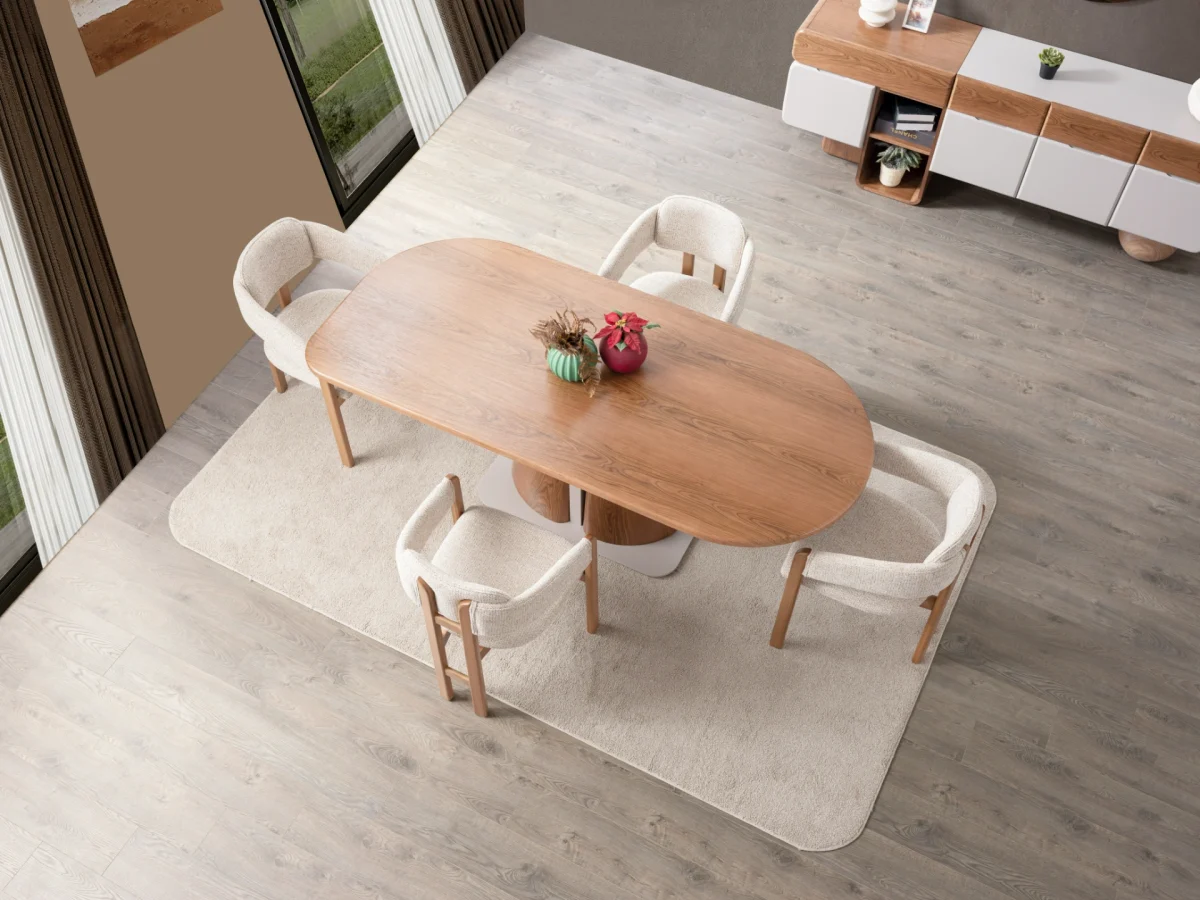 The Milan Dining Table Set is a masterpiece of contemporary craftsmanship. Designed to be the heart of your home, this set includes a stunning dining table with a bold, sculptural pedestal. Its rounded edges create an atmosphere perfect for long meals and meaningful conversations.