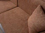 The Milan Sofa is an expression of modern elegance and organic design. This unique sofa is meticulously crafted for contemporary European homes. The rich, tactile fabric adds warmth and a high-end feel to any living space.