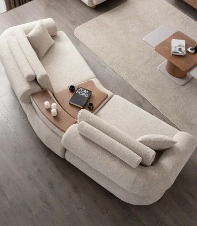 The Milan Sofa is an expression of modern elegance and organic design. This unique sofa is meticulously crafted for contemporary European homes. The rich, tactile fabric adds warmth and a high-end feel to any living space.