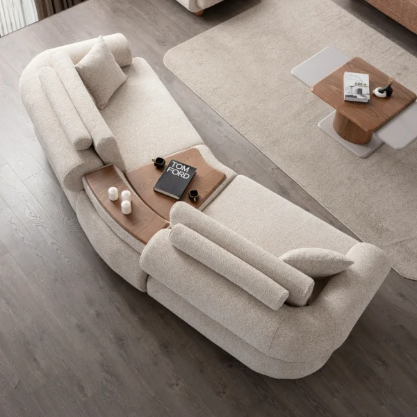 The Milan Sofa is an expression of modern elegance and organic design. This unique sofa is meticulously crafted for contemporary European homes. The rich, tactile fabric adds warmth and a high-end feel to any living space.