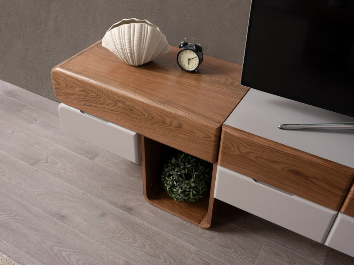 The Milan Modern TV Console Unit is designed for those who appreciate the beauty of contemporary minimalism. Reflecting the organic curves and refined materials found in the Milan collection, this piece serves as the perfect focal point for your living room.