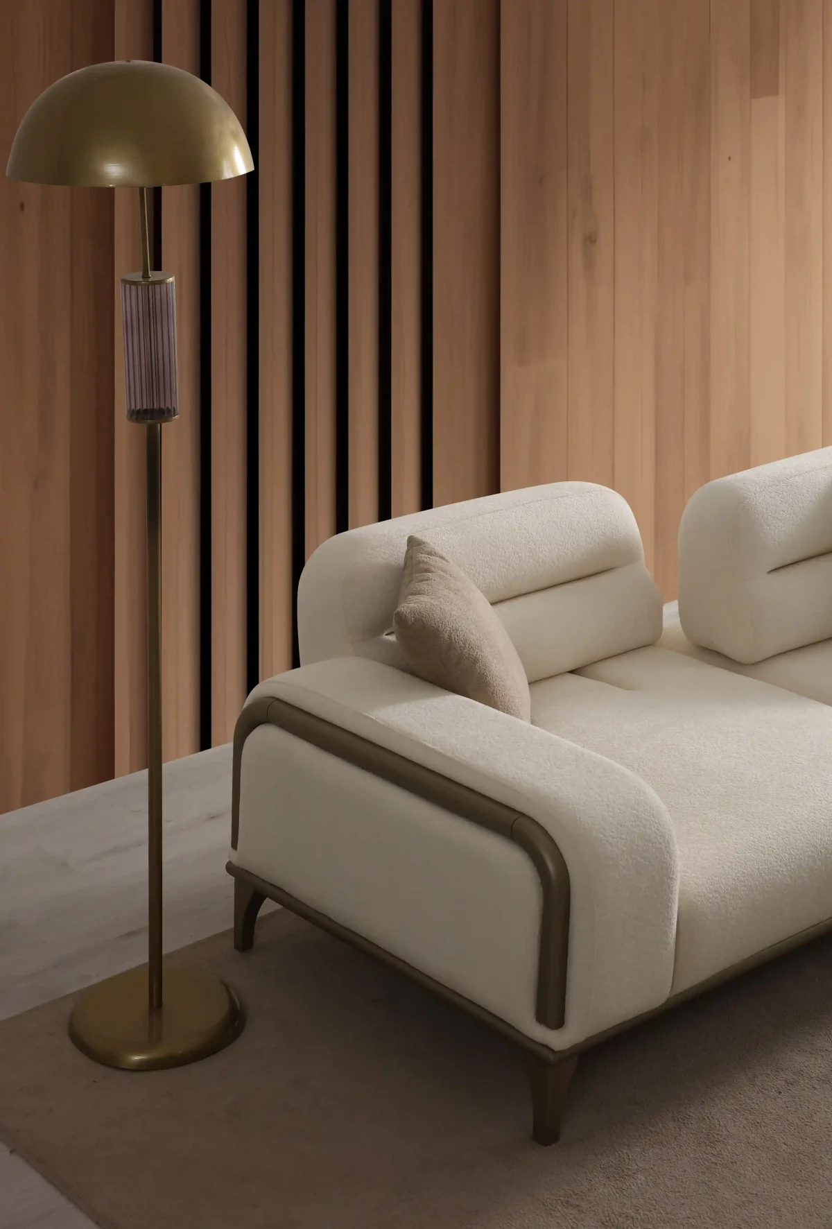 A prestigious Nadora Sofa arranged in a grand, high-ceiling living room, reflecting a luxurious and sophisticated lifestyle.