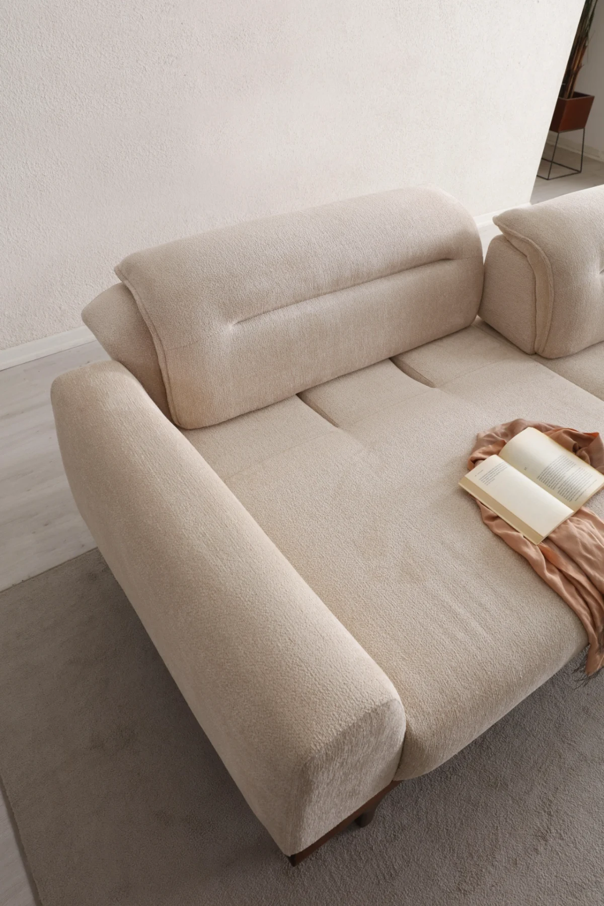The Noa Sofa is a masterpiece of contemporary Turkish craftsmanship, designed exclusively for distinguished European homes. Its fluid, organic silhouette is upholstered in high-quality fabric that invites you to relax. This sofa is more than just a piece of furniture; it's a style statement that adds an airy, modern feel to any living space.