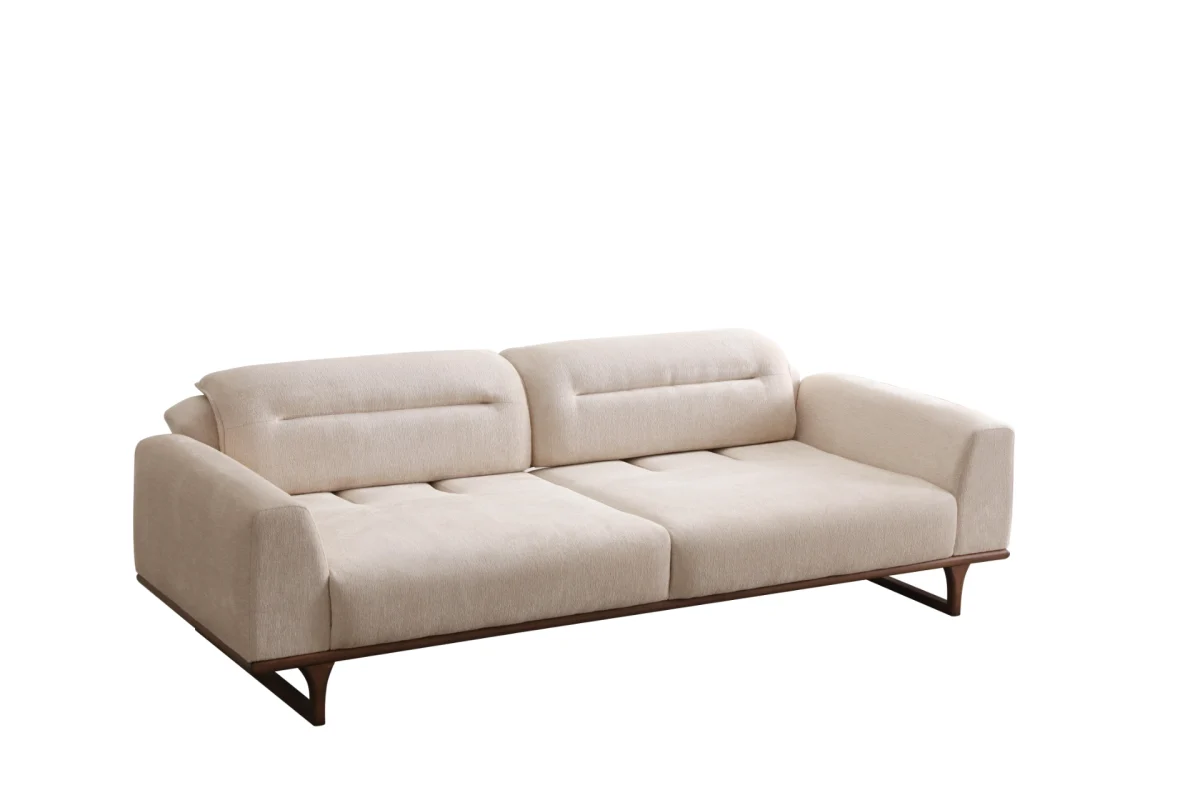The Noa Sofa is a masterpiece of contemporary Turkish craftsmanship, designed exclusively for distinguished European homes. Its fluid, organic silhouette is upholstered in high-quality fabric that invites you to relax. This sofa is more than just a piece of furniture; it's a style statement that adds an airy, modern feel to any living space.