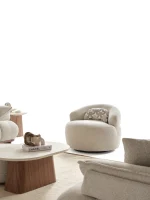 The Nola Armchair is the ultimate design piece for modern interiors. Its soft texture offers the perfect blend of luxury and comfort.