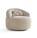 The Nola Armchair is the ultimate design piece for modern interiors. Its soft texture offers the perfect blend of luxury and comfort.