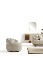 The Nola Armchair is the ultimate design piece for modern interiors. Its soft texture offers the perfect blend of luxury and comfort.