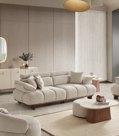 Ervaar comfort met de Nola loungeset. De elegante stof en gebogen vorm bieden een perfecte combinatie van moderne esthetiek en comfortabel wonen.